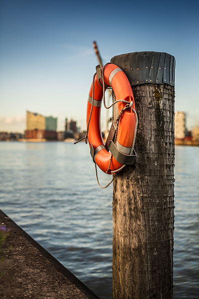 Rettungsring und Elbphilharmonie - Hamburg Bild auf Leinwand, Acrylglas, Akustikbild oder als Poster