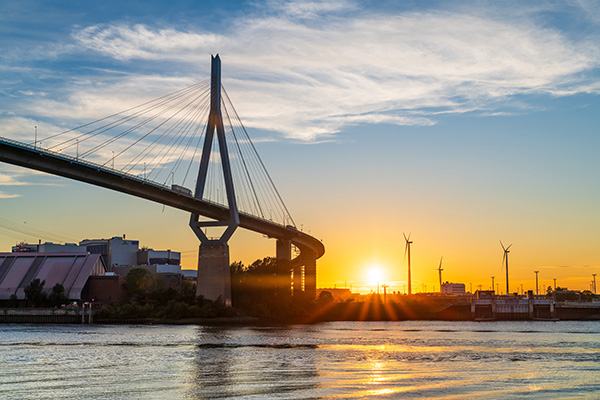 Sonnenuntergang an der Köhlbrandbrücke - Hamburger Hafen Wandbild auf Leinwand, Acrylglas, Akustikbild oder als Poster